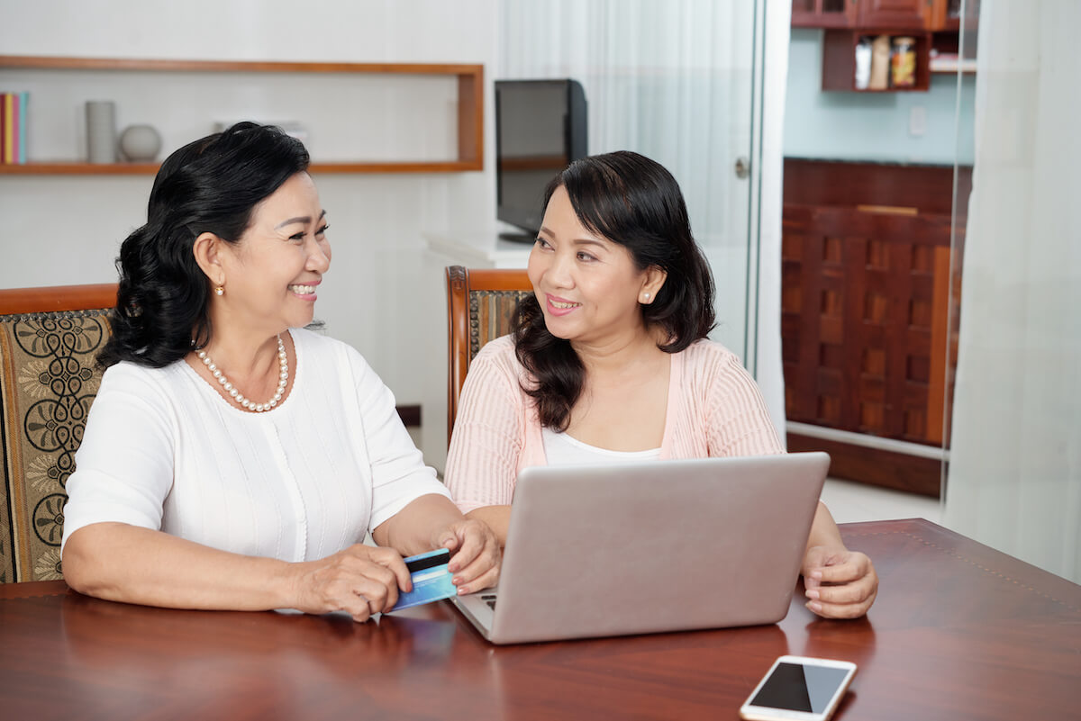 woman looking on laptop