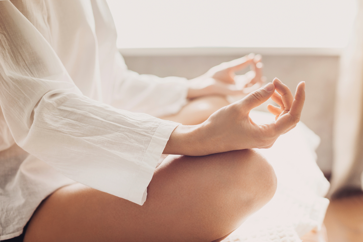 Woman Sitting and Meditating-Franklin Park Senior Living