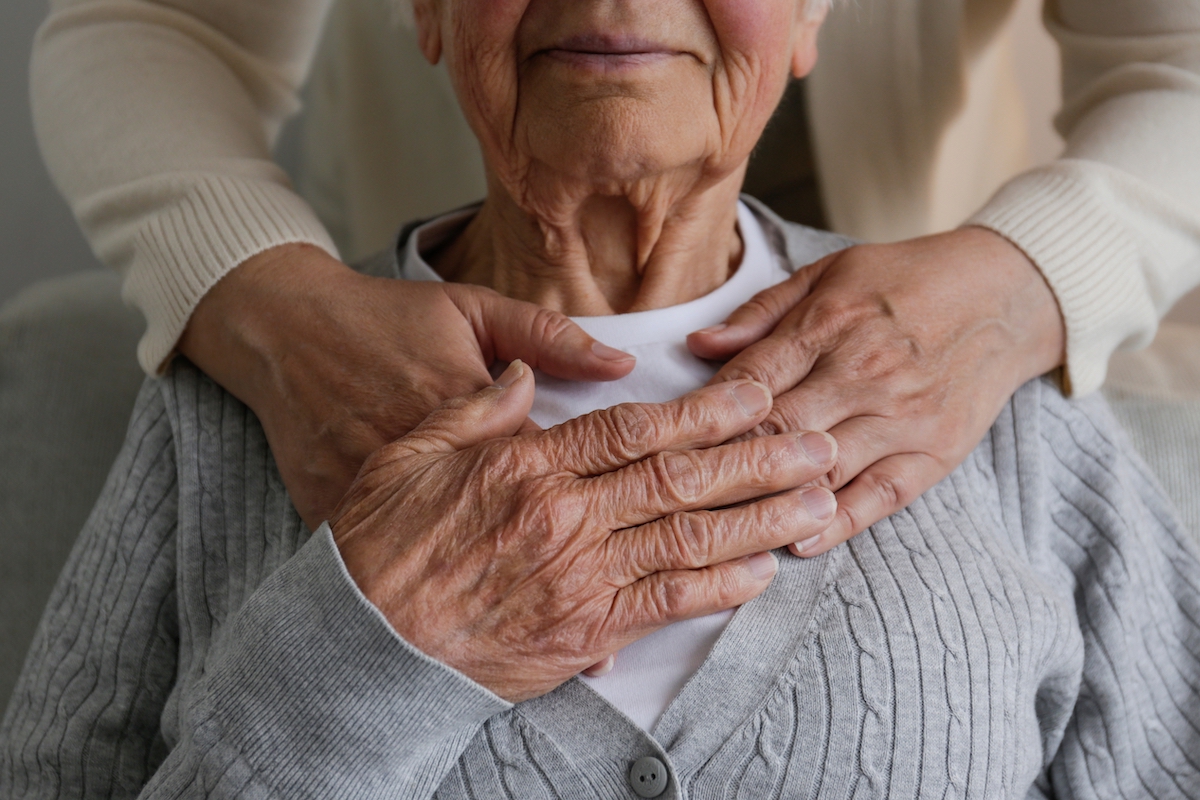 Senior Woman with Adult Daughter Hugging Her From Behind_Franklin Park® Senior Living