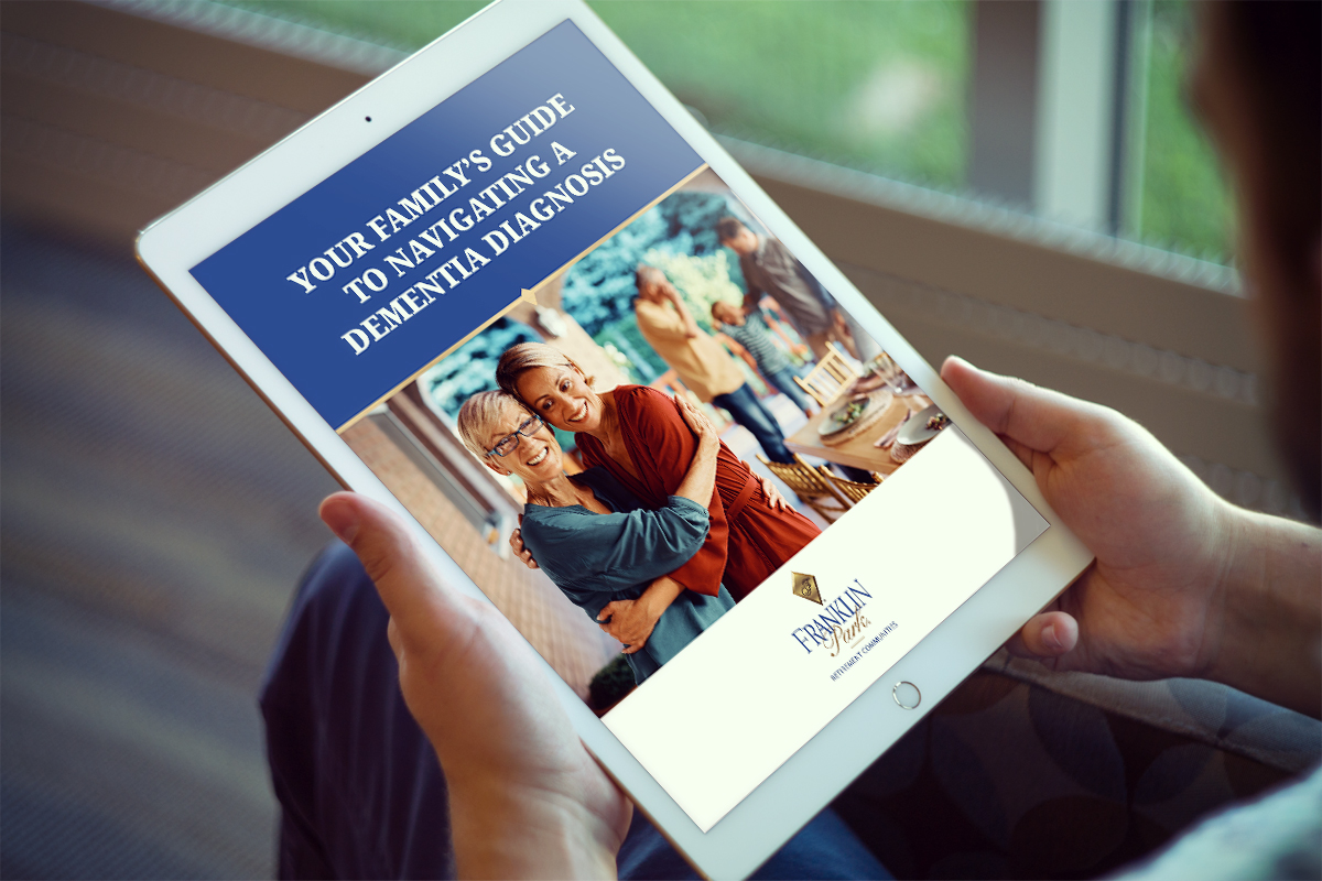Tablet displaying dementia diagnosis family guide cover