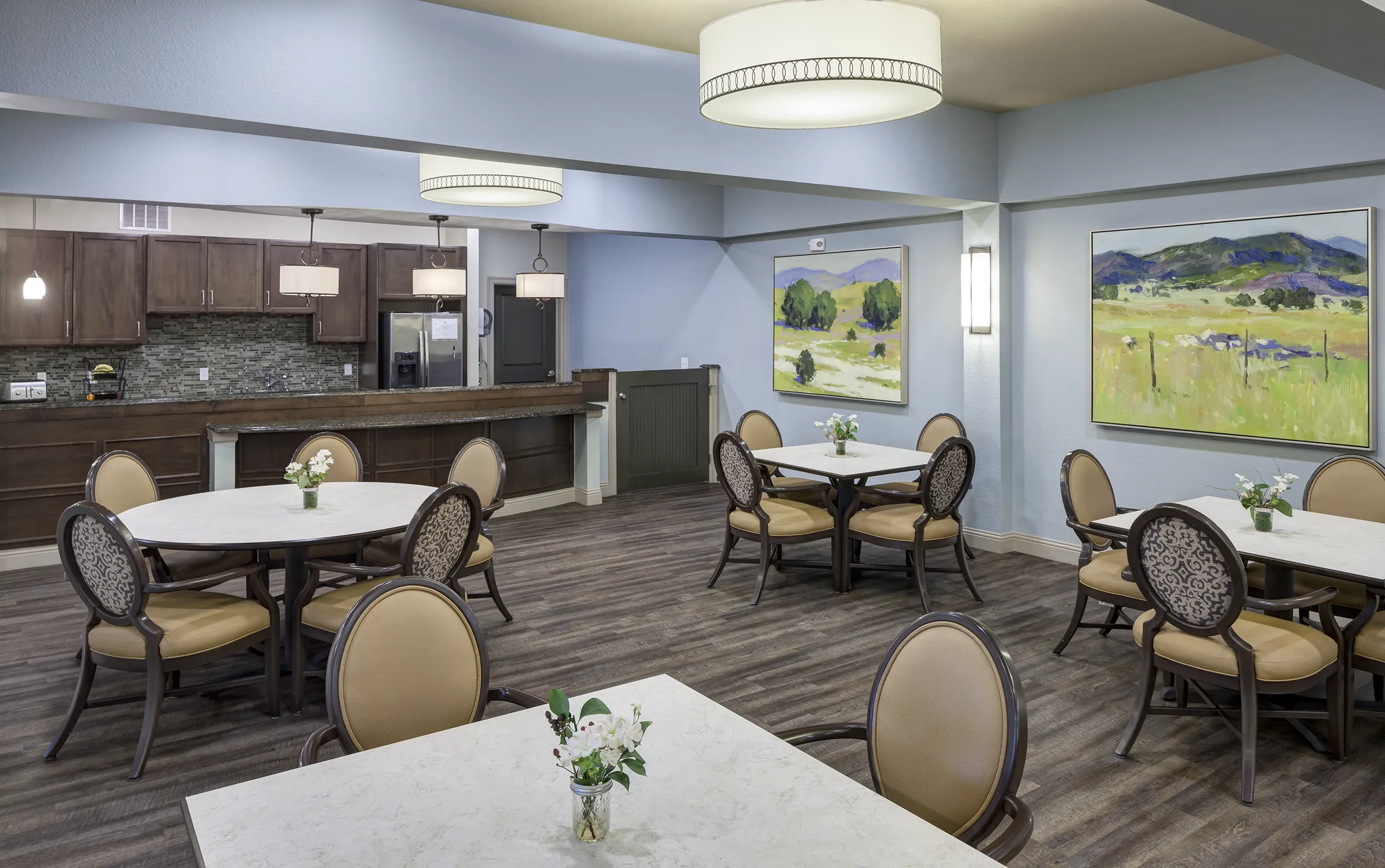 Modern communal dining area with round tables