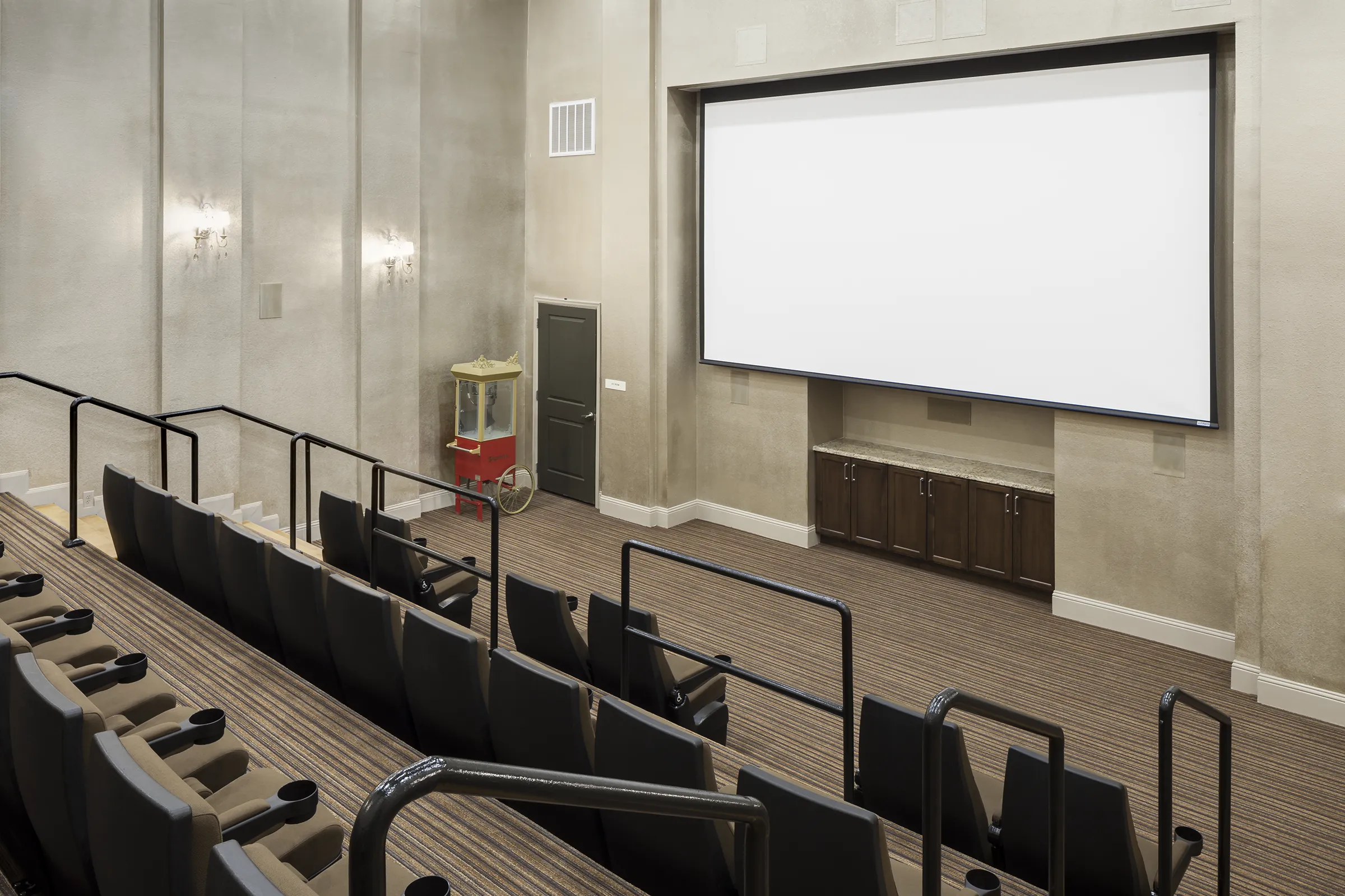Small private theater with large projection screen